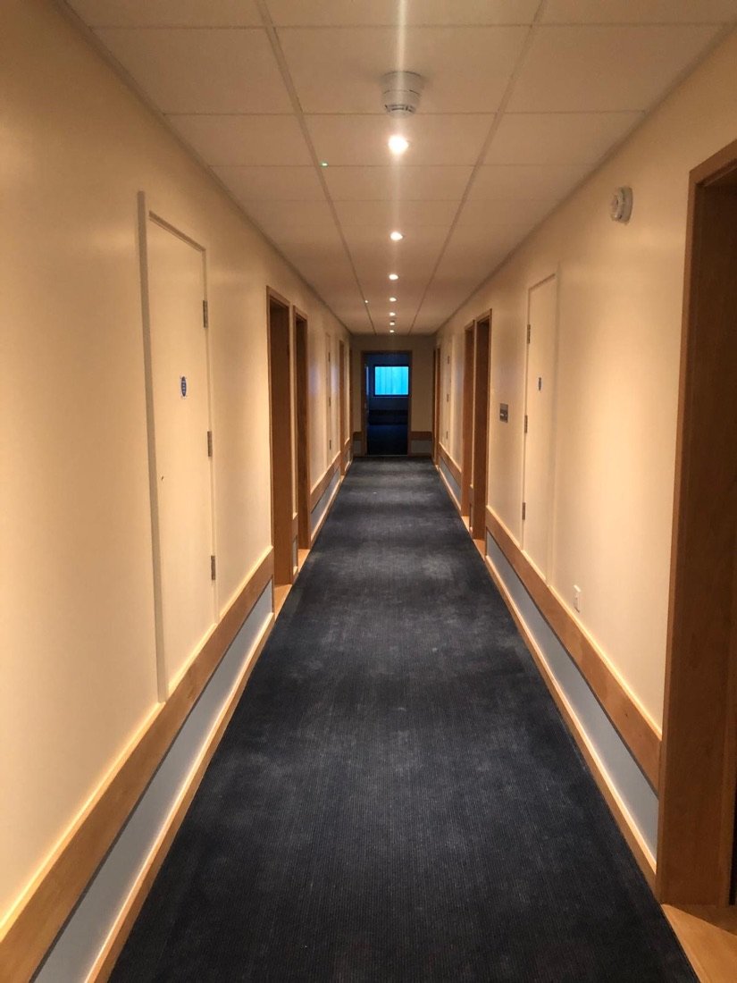 Hotel corridor freshly redecorated out-of-hours